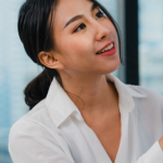Professional working with AI content tools on a laptop, representing in-demand digital skills in Singapore