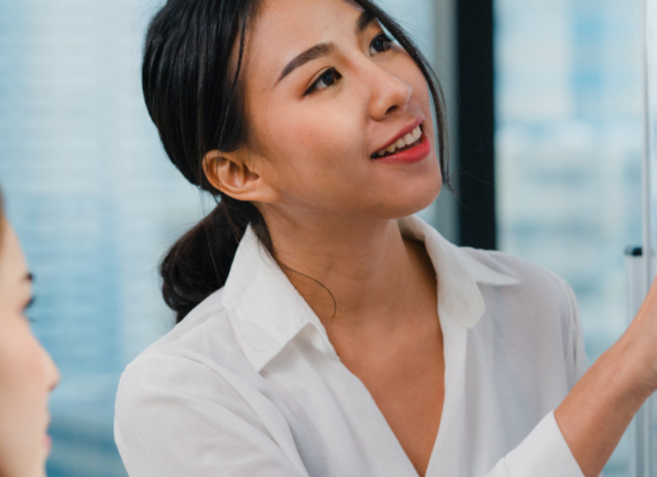 Professional working with AI content tools on a laptop, representing in-demand digital skills in Singapore